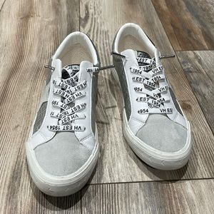 VH EST silver and white flats. Size 7. Brand new.